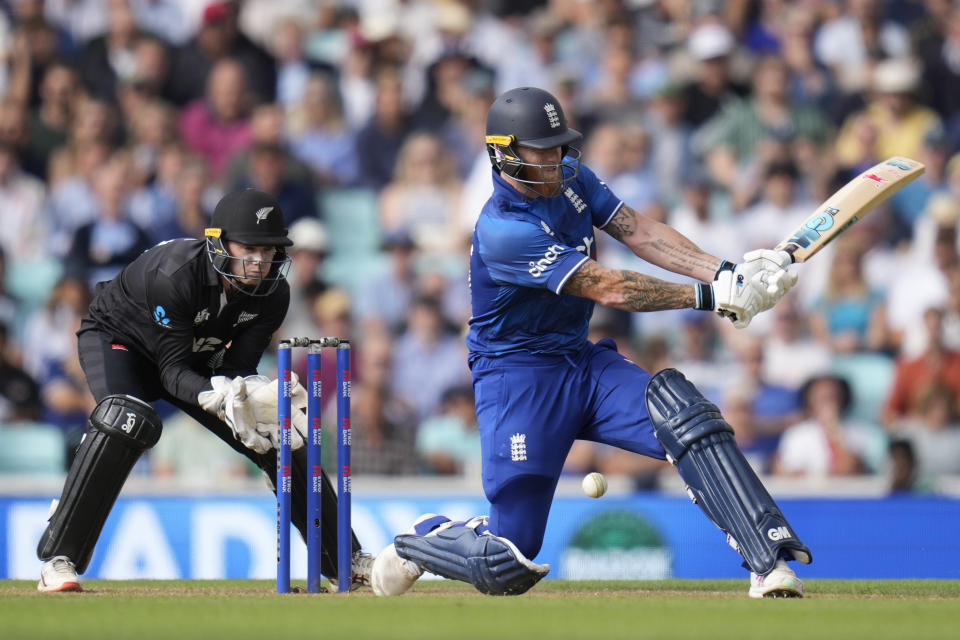 England's Ben Stokes plays a shot off the bowling of New Zealand's Glenn Phillips during the One Day International cricket match between England and New Zealand at The Oval cricket ground in London, Wednesday, Sept. 13, 2023. (AP Photo/Kirsty Wigglesworth)