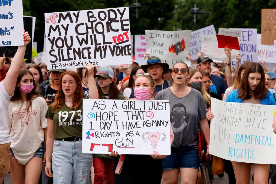 Abortion rights protesters march through downtown Raleigh, N.C. during the Bans Off Our Bodies abortion rights march and rally Saturday, May 14, 2022.