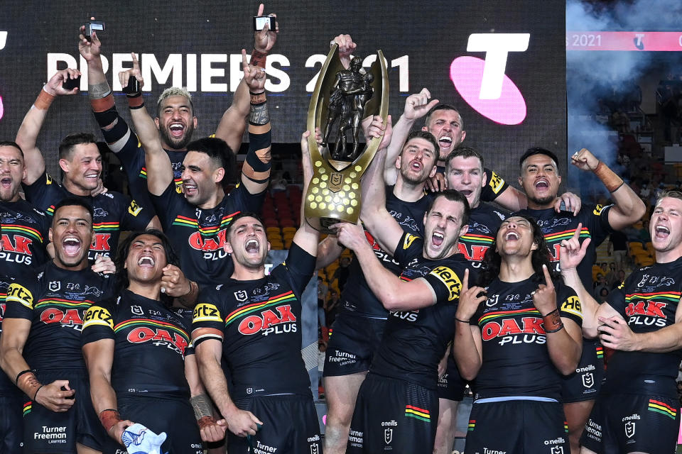 Seen here, Panthers players celebrate their NRL grand final win over the Rabbitohs.