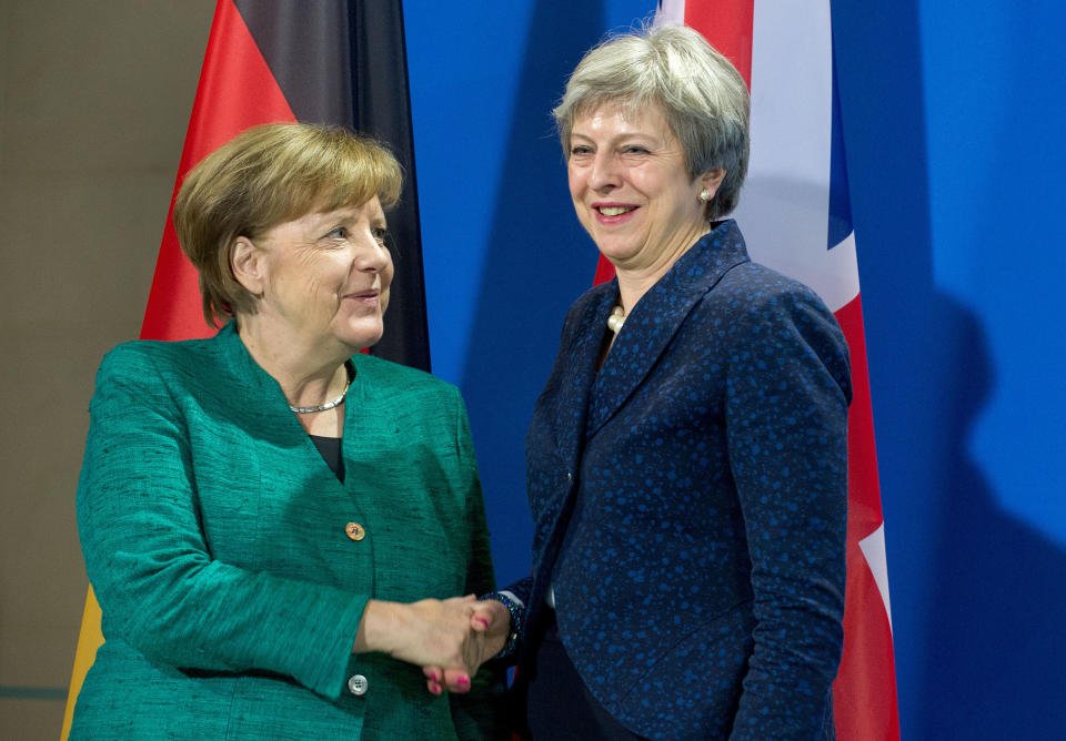 Angela Merkel shakes hands with Theresa May (Getty Images)