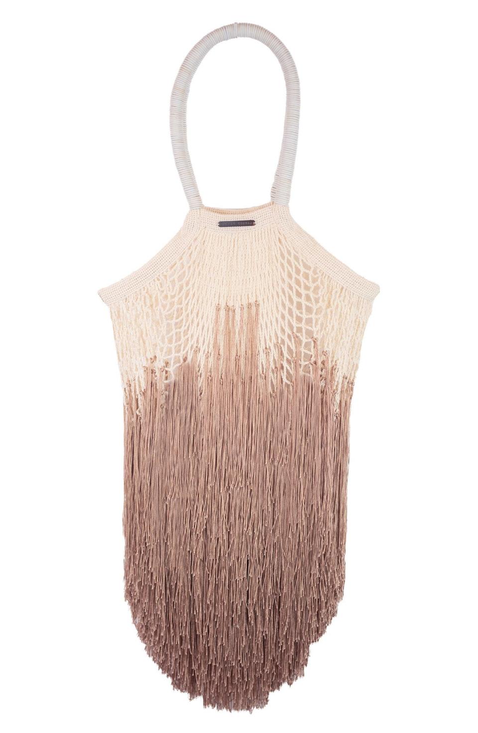 <p><a href="https://go.redirectingat.com?id=74968X1596630&url=https%3A%2F%2Fwww.nordstrom.com%2Fs%2Fpetit-kouraj-large-fringe-top-handle-bag%2F6520760&sref=https%3A%2F%2Fwww.harpersbazaar.com%2Ffashion%2Ftrends%2Fg38804191%2Fblack-owned-handbag-brands%2F" rel="nofollow noopener" target="_blank" data-ylk="slk:Shop Now;elm:context_link;itc:0;sec:content-canvas" class="link ">Shop Now</a></p><p>Large Fringe Top Handle Bag</p><p>$495.00</p><p>nordstrom.com</p>