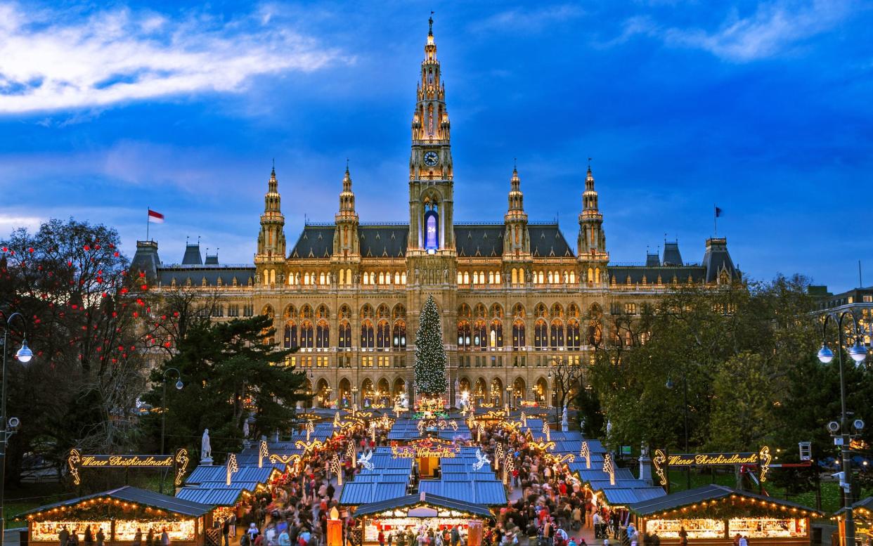 As the market buzzes, children can learn to make cookies inside Vienna's city hall - This content is subject to copyright.