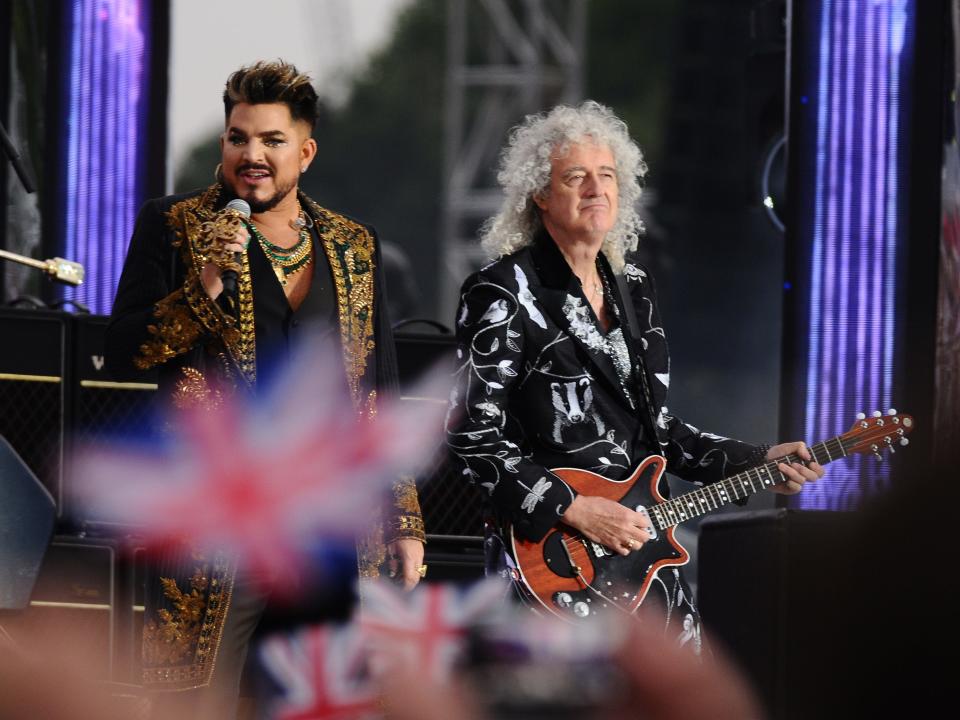 Brian May and Adam Lambert of Queen perform during the Platinum Party At The Palace at Buckingham Palace.