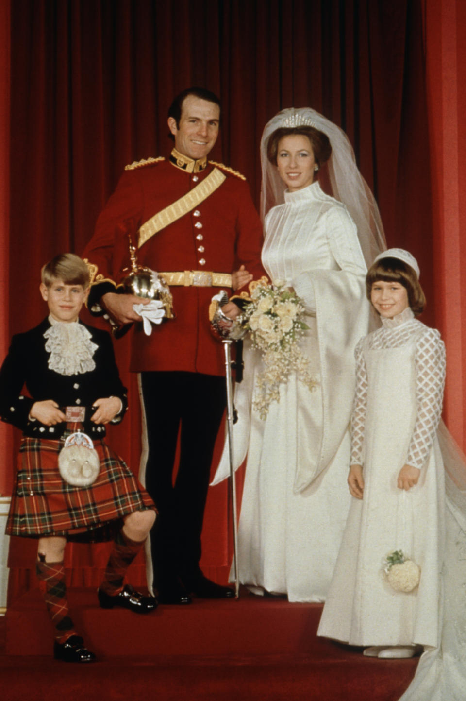 Princess Anne on her wedding day with her husband Mark Phillips, her younger brother Prince Edward, and cousin Lady Sarah Armstrong-Jones. (Photo by © Hulton-Deutsch Collection/CORBIS/Corbis via Getty Images)