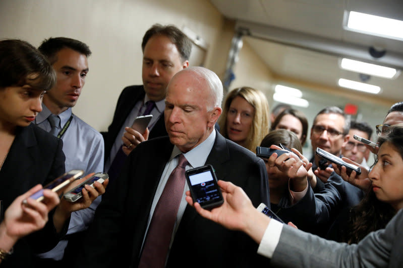 Sen. John McCain (R-AZ) speaks with reporters ahead of the party luncheons on Capitol Hill in Washington, U.S., September 19, 2017. REUTERS/Aaron P. Bernstein