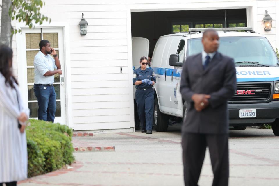 Tragedy: The coroner pictured at Kim Porter's residence on Thursday (Karl Larsen / SplashNews.com)