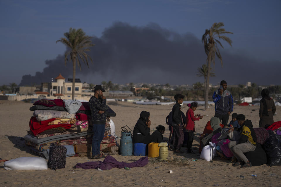 Palestinians who flee from Khan Younis from Israeli ground and air offensive on the Gaza Strip arrive in Rafah, southern Gaza, Monday, Jan. 22, 2024. (AP Photo/Fatima Shbair)