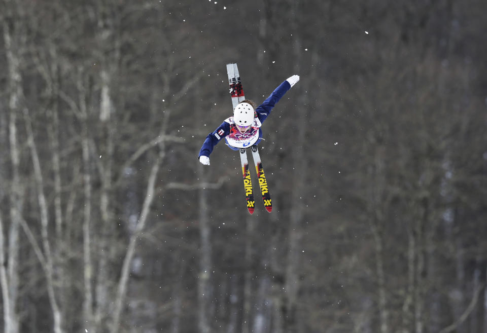 Ashley Caldwell of the United States jumps during freestyle skiing aerials training at the Rosa Khutor Extreme Park at the 2014 Winter Olympics, Monday, Feb. 10, 2014, in Krasnaya Polyana, Russia. (AP Photo/Andy Wong)