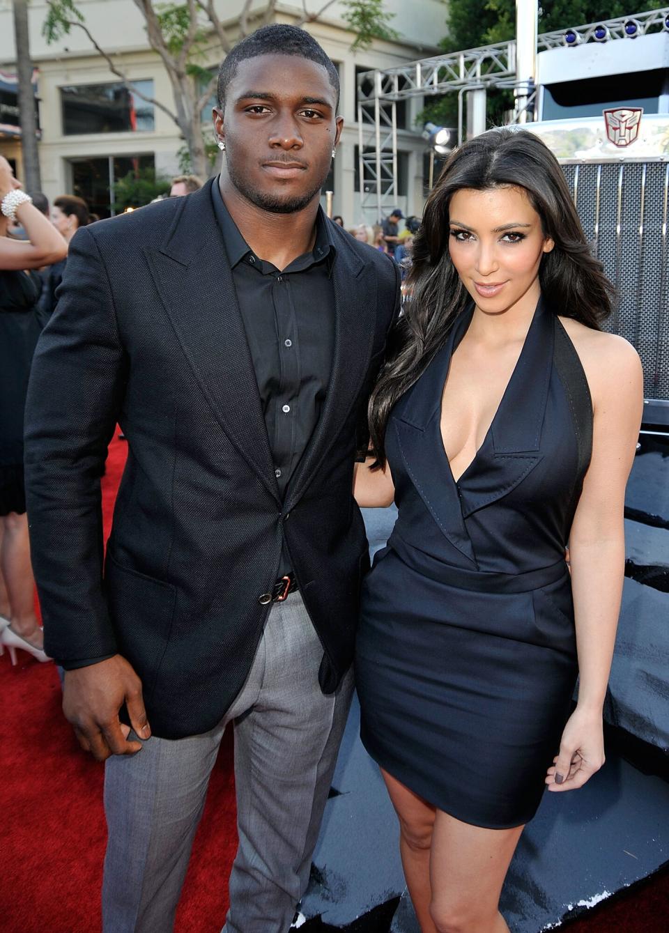 Reggie Bush (L) and TV personality Kim Kardashian arrive at the premiere of Dreamworks' "Transformers: Revenge Of The Fallen" held at Mann Village Theatre on June 22, 2009 in Los Angeles, California