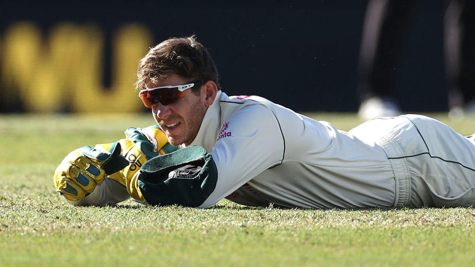 Pictured here, Tim Paine looks sheepish after dropping a catch at the SCG.