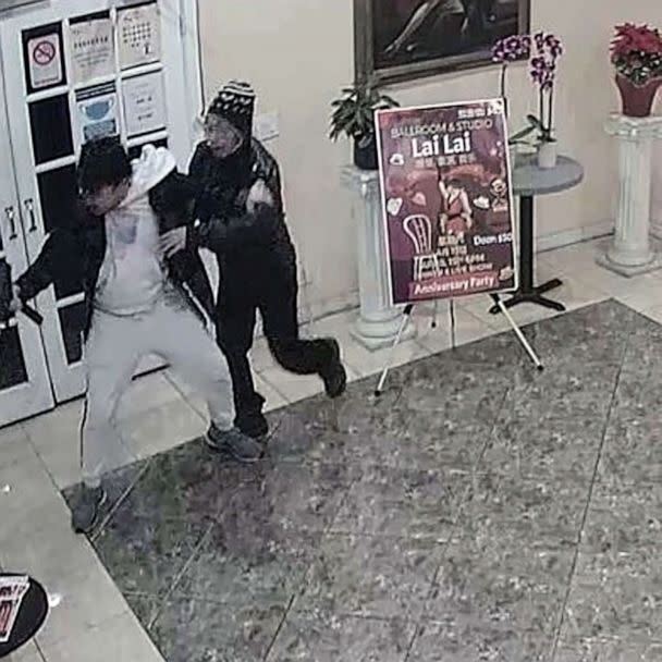 PHOTO: Brandon Tsay is seen in surveillance video wrestling a gun away from Huu Can Tran, 72, who is alleged to have killed 10 people in nearby Monterey Park, in a dance hall in Alhambra, Calif, on Jan. 21, 2023. (Lai Lai Ballroom)