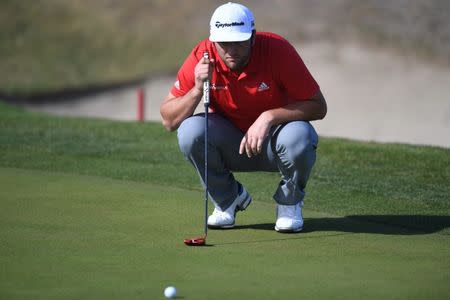 Jan 21, 2018; La Quinta, CA, USA; Jon Rahm lines up a putt on the seventh green during the final round of the CareerBuilder Challenge golf tournament at PGA West TPC Stadium Course. Mandatory Credit: Joe Camporeale-USA TODAY Sports