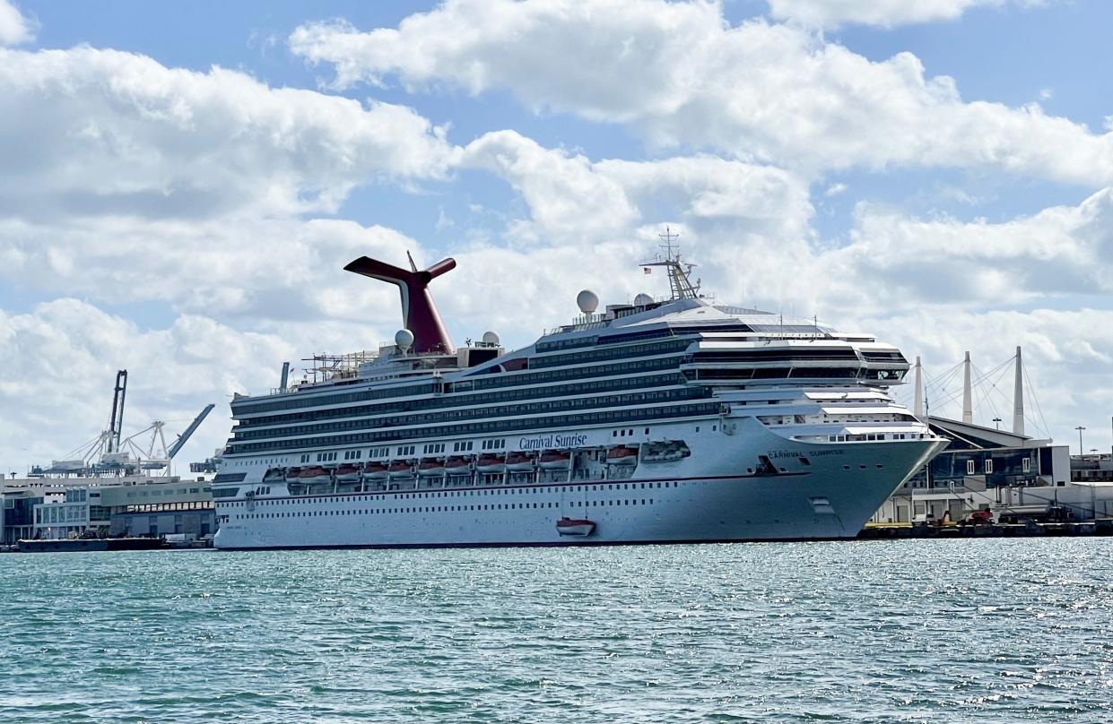 The cruise ship "Carnival Sunrise" part of the Carnival Cruise Line, is seen moored at a quay in the port of Miami, Florida, on December 23, 2020, amid the Coronavirus pandemic. (Photo by Daniel SLIM / AFP) (Photo by DANIEL SLIM/AFP via Getty Images)