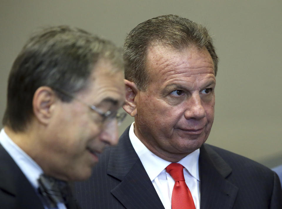 Former sheriff of Broward County Scott Israel, right, and his attorney Benedict Knuhne wait their turn to speak to the Senate Rules Committee concerning his dismissal by Gov. Ron DeSantis, Monday Oct. 21, 2019, in Tallahassee, Fla. (AP Photo/Steve Cannon)