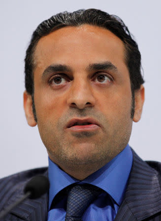 Aarbar-Chairman Khadem Al-Qubaisi attends a news conference in Stuttgart March 23, 2009. REUTERS/Johannes Eisele/Files