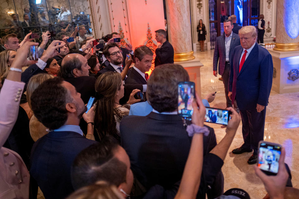 Trump talks to the press on the grounds of his Mar-a-Lago resort on midterm elections night. 