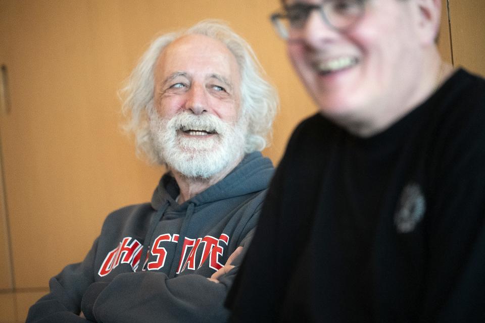 Nobel Laureate Pierre Agostini laughs Wedsnesday as he is interviewed at the Ohio State University's Physics Research Building on the Columbus main campus. Agostini is an OSU professor emeritus.