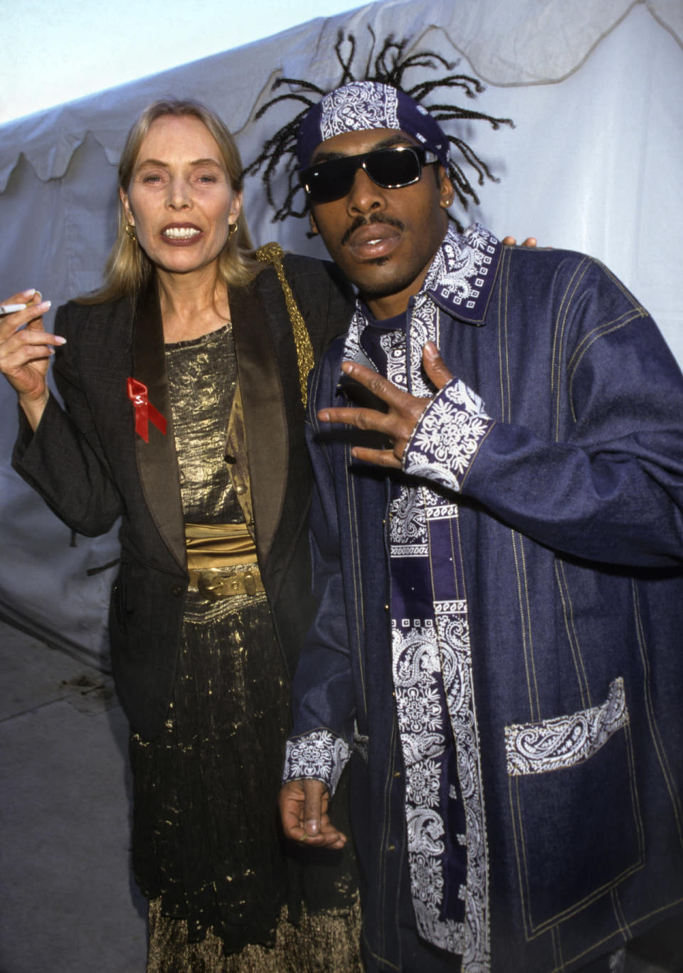 Joni Mitchell and Coolio at the 1996 Grammy Awards.