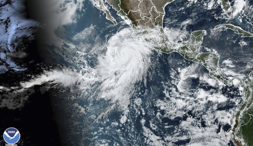 A satellite image taken Thursday morning shows Hurricane Hilary off the Pacific coast of Mexico.