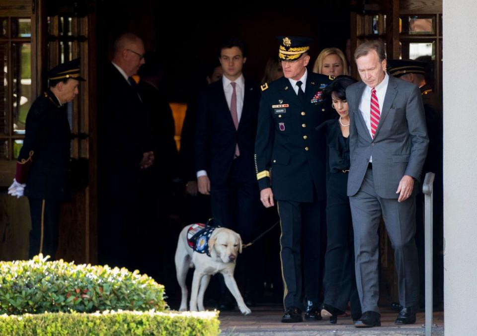 1) Members of the Bush family exit the funeral home in Houston.