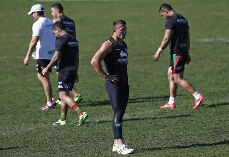 Sam Burgess (C), from England, attend a training session of the rugby league club 'Sydney Rabbitohs' in Sydney September 3, 2013. REUTERS/Daniel Munoz