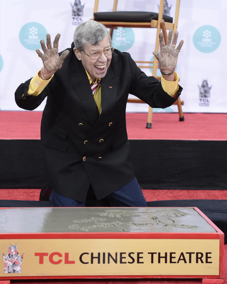 Actor and comedian Jerry Lewis is honored with a hand and footprint ceremony at TCL Chinese Theatre on Saturday, April 12, 2014 in Los Angeles. (Photo by Dan Steinberg/Invision/AP Images)