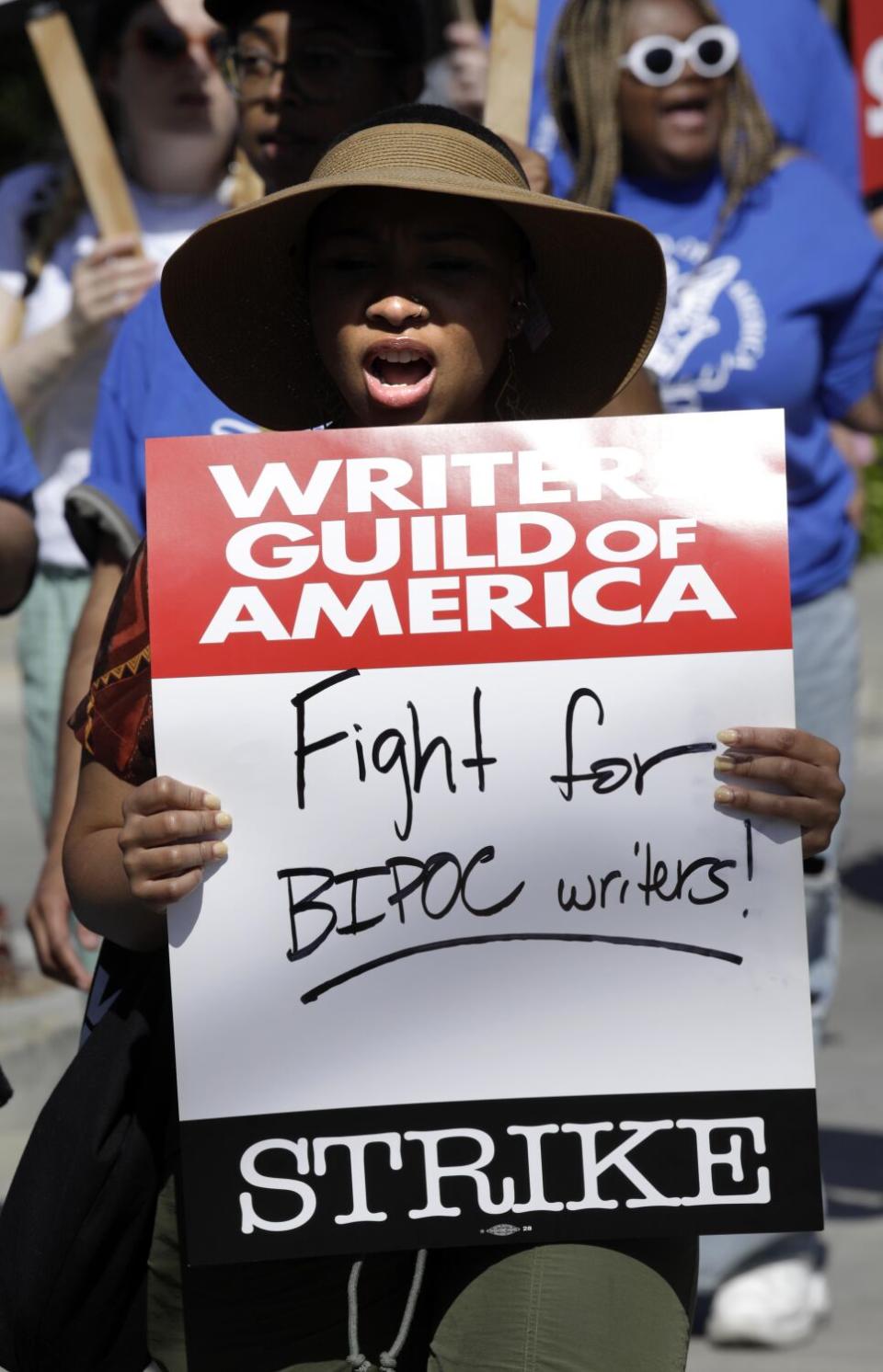 Kyra Jones joins fellow WGA members who walk the picket line on the first day of their strike