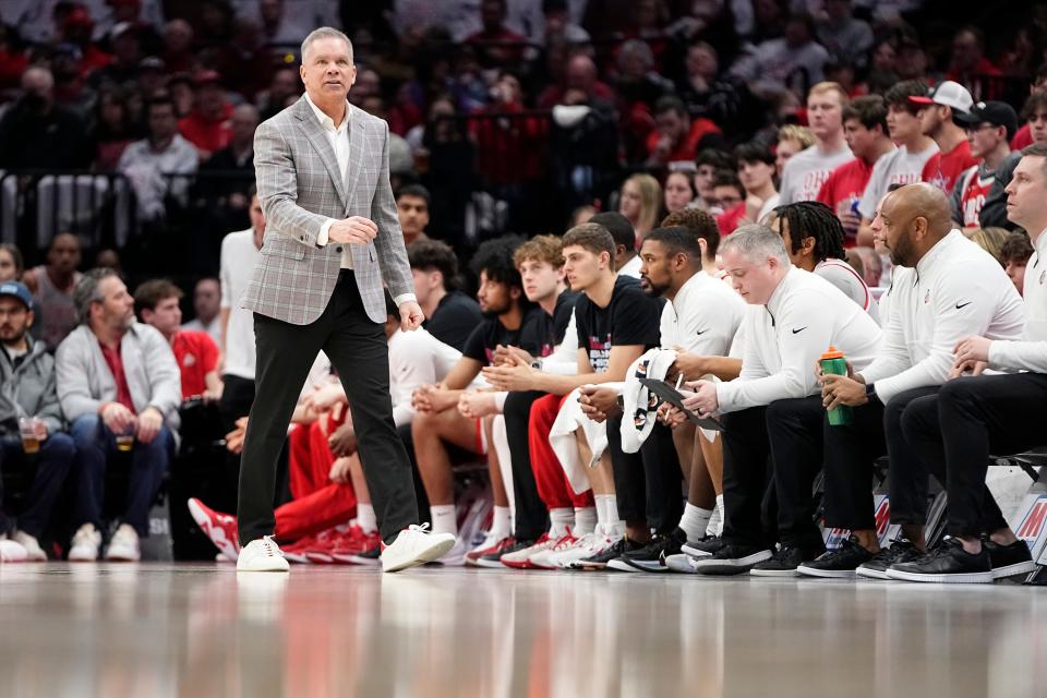 Feb 6, 2024; Columbus, Ohio, USA; Ohio State Buckeyes head coach Chris Holtmann watches from the sideline during the first half of the men’s basketball game against the Indiana Hoosiers at Value City Arena.