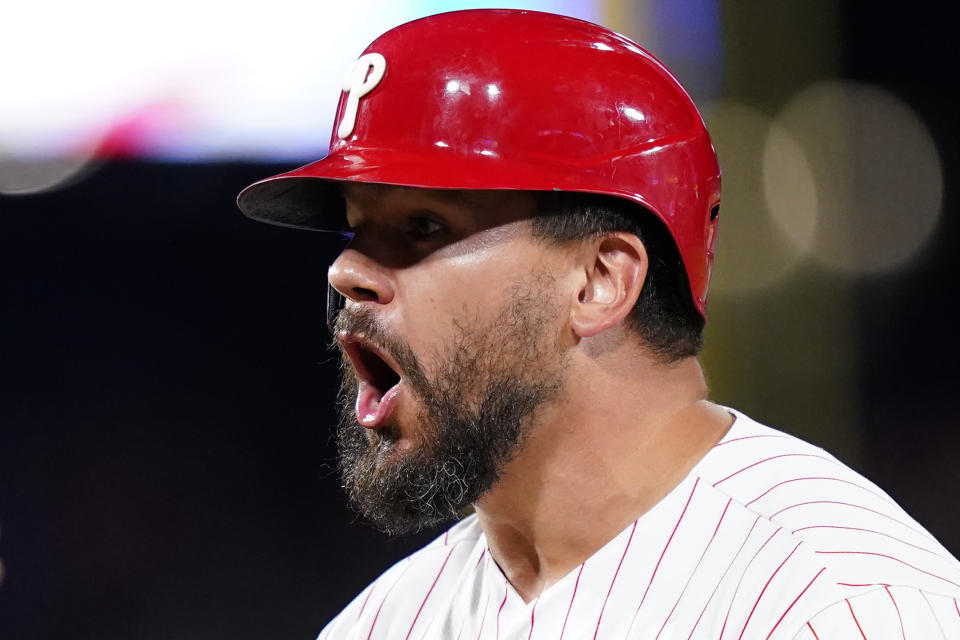 Philadelphia Phillies' Kyle Schwarber reacts after hitting a run-scoring single against Miami Marlins pitcher Sandy Alcantara during the eighth inning of a baseball game, Wednesday, Aug. 10, 2022, in Philadelphia. (AP Photo/Matt Slocum)