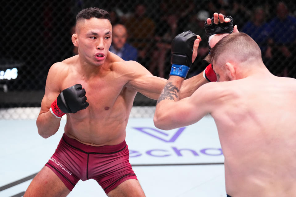 LAS VEGAS, NEVADA – AUGUST 29: (L-R) Timothy Cuamba punches Mateo Vogel of Canada in their featherweight fight during Dana White’s Contender Series season seven, week four at UFC APEX on August 29, 2023 in Las Vegas, Nevada. (Photo by Chris Unger/Zuffa LLC via Getty Images)