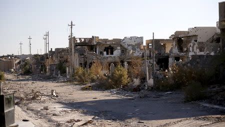 Destroyed buildings are seen in the city of Ramadi, in this January 16, 2016 file photo. REUTERS/Thaier Al-Sudani/Files