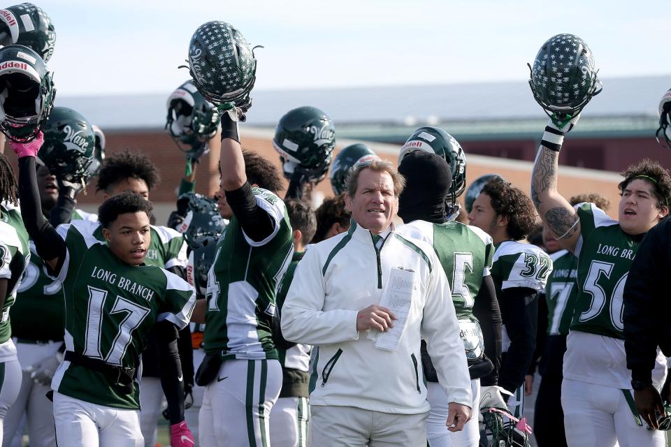 Long Branch head coach Dan George prior to the 2021 Thanksgiving game against Red Bank, in George's final season on the Green Wave sideline.