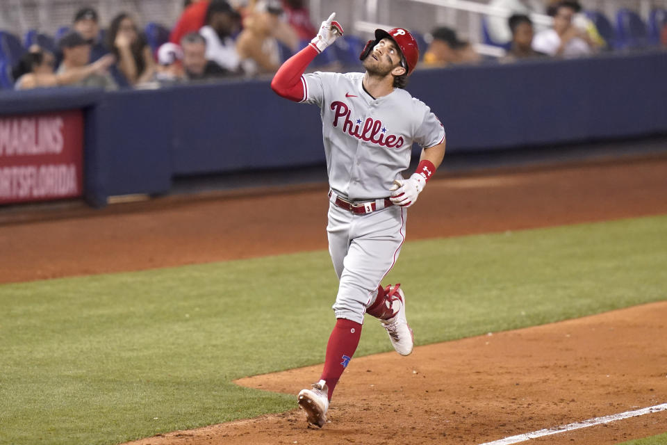 Philadelphia Phillies' Bryce Harper rounds the bases after hitting a solo home run during the fifth inning of a baseball game against the Miami Marlins, Friday, Oct. 1, 2021, in Miami. (AP Photo/Lynne Sladky)