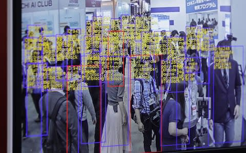 The object detection and tracking technology developed by SenseTime Group Ltd. is displayed on a screen at the Artificial Intelligence Exhibition & Conference in Tokyo, Japan, on Wednesday, April 4, 2018 - Credit: Bloomberg