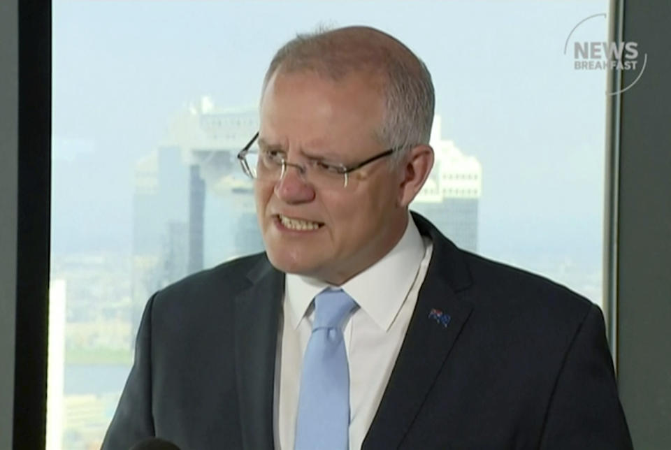 In this image made from video, Australian Prime Minister Scott Morrison speaks in Osaka, western Japan, Friday, June 28, 2019. Morrison said he remained concerned for an Australian student who is uncontactable in North Korea and has been offered international support to find him. Morrison said the plight of Alek Sigley had been raised with him by world leaders attending the Group of 20 summit in Osaka, including Japanese Prime Minister Shinzo Abe. (Australian Broadcasting Corporation via AP)