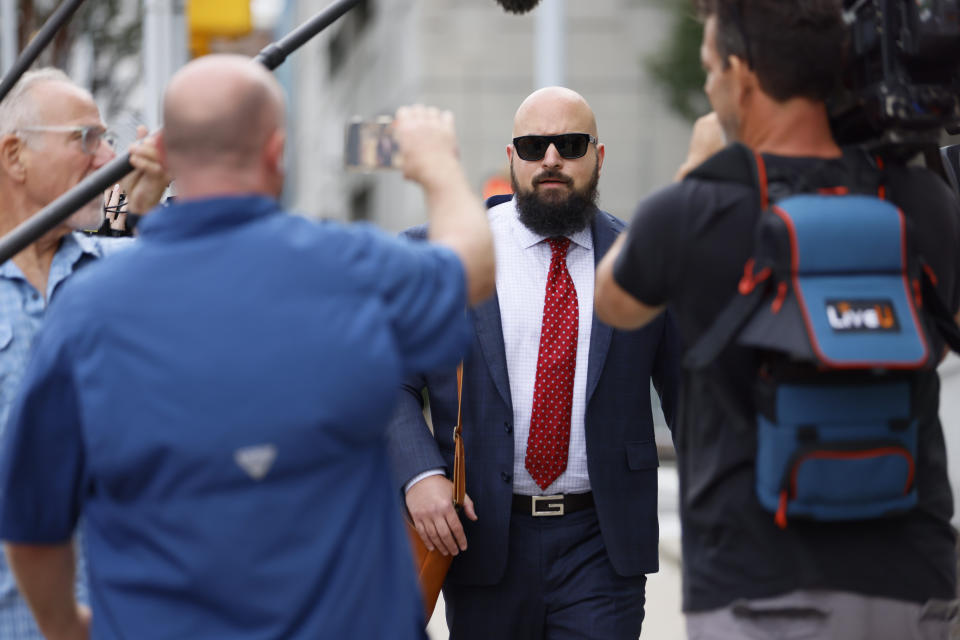 Attorney Scott Grubman, who is defending Kenneth Chesebro, arrives at the Fulton County Superior Court for the motion hearing on Thursday, Sept. 14, 2023, in Atlanta. Donald Trump will not face trial next month in Georgia after a judge ruled Thursday that the former president and 16 others accused of illegally trying to overturn the results of the 2020 election will be tried separately from two lawyers in the case. Lawyers Sidney Powell and Kenneth Chesebro had filed demands for a speedy trial, and Fulton County Superior Court Judge Scott McAfee set their trial to begin Oct. 23. (Miguel Martinez/Atlanta Journal-Constitution via AP)