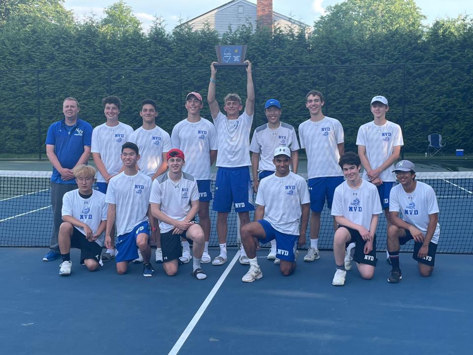 Members of the NV/Demarest boys tennis team pose with the North 1, Group 2 sectional title, the program's fifth straight championship.