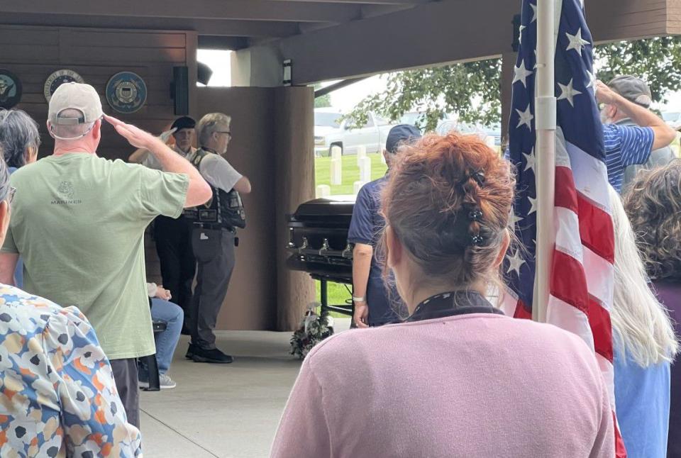 Dozens of people attended the funeral of local Marine veteran James Brooks at the Dayton National Cemetery Thursday. Brooks died at the Dayton VA recently, but had no known family members. (Xavier Hershovitz/Staff)