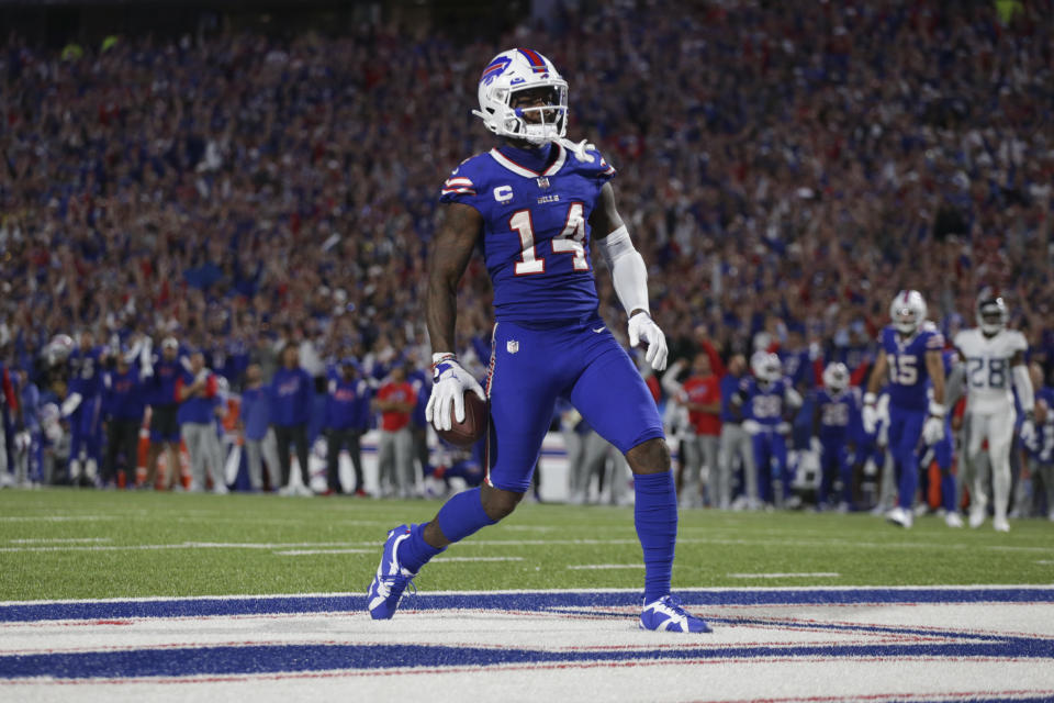 ORCHARD PARK, NEW YORK - SEPTEMBER 19: Stefon Diggs #14 of the Buffalo Bills celebrates a touchdown catch during the third quarter against the Tennessee Titans at Highmark Stadium on September 19, 2022 in Orchard Park, New York. (Photo by Joshua Bessex/Getty Images)