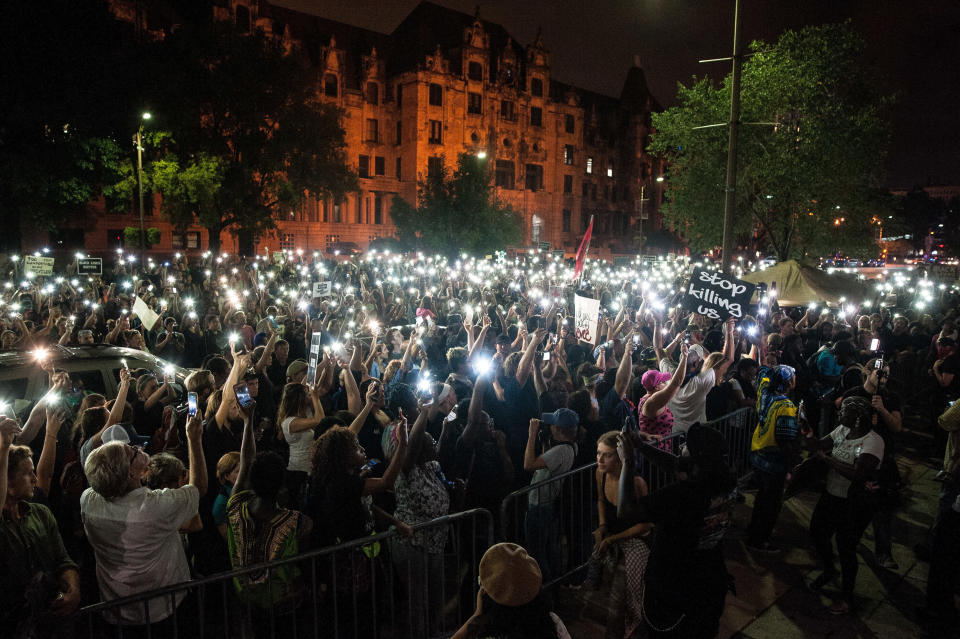 Protesters gather on Monday outside the St. Louis City Justice Center, where demonstrators arrested the prior night were still being held.