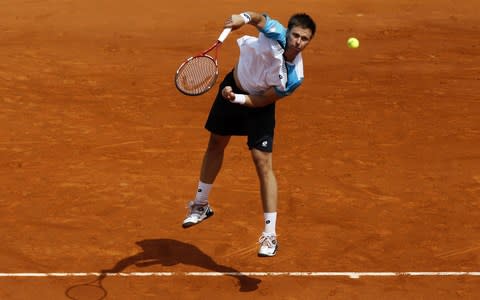 Robin Soderling of Sweden serves during the men's singles round two match between Albert Ramos of Spain and Robin Soderling of Sweden on day five of the French Open at Roland Garros on May 26, 2011 in Paris, France - Credit: Getty Images