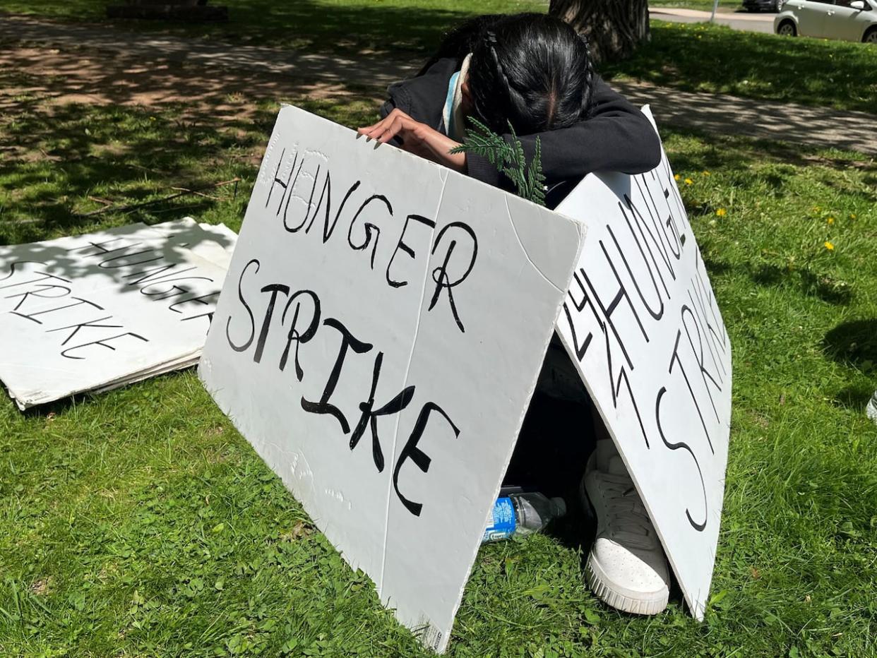 Foreign workers say they will step up their protest if they do not hear from the government before Tuesday. (Wayne Thibodeau/CBC - image credit)