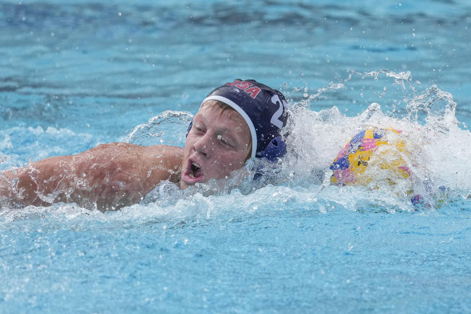 Chase Dodd practices during a training session Wednesday, Jan. 17, 2024, at Mount San Antonio College in Walnut, Calif. The U.S. water polo teams for the Olympics could have a much deeper connection than just a mutual love of their grueling sport. Chase and Ryder Dodd are trying to make the men's roster, alongside another pair of brothers in Dylan and Quinn Woodhead. Ella Woodhead, Dylan and Quinn's sister, is in the mix for the loaded women's squad. (AP Photo/Damian Dovarganes)