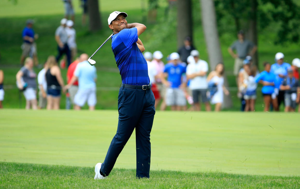 Tiger Woods holed out for an eagle on No. 11 on Friday at the Memorial Tournament at Murifield Village in Dublin, Ohio. The crowd, naturally, went crazy. (Getty Images)