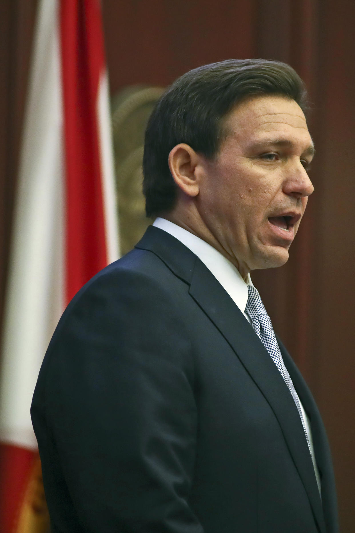Florida Gov. Ron DeSantis gives his State of the State address during a joint session of the Senate and House of Representatives Tuesday, March 7, 2023, at the Capitol in Tallahassee, Fla. (AP Photo/Phil Sears)