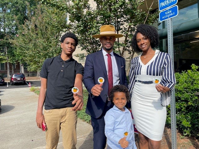 Bryce Brooks (left) with his father Alfred “Shivy” Brooks II, his mother Crystal Brooks and his younger brother, Christian.