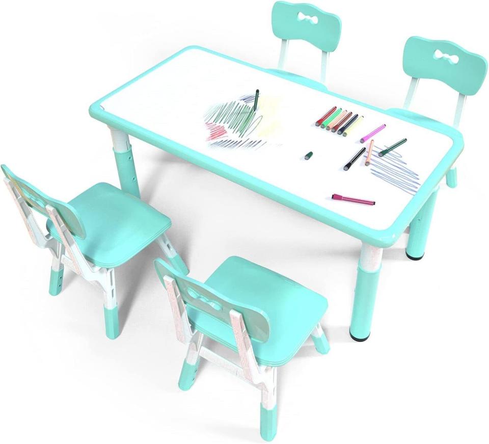 Leave your little one to color and don't stress about getting your furniture ruined with this dry erase drawing board table with four chairs. Promising review: 