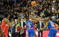 Jan 17, 2019; London, ENG; Washington Wizards guard Bradley Beal (3) passes to center Thomas Bryant (13) who scores the winning basket during the fourth quarter of the game against the New York Knicks at The O2 Arena. Mandatory Credit: Steve Flynn-USA TODAY Sports