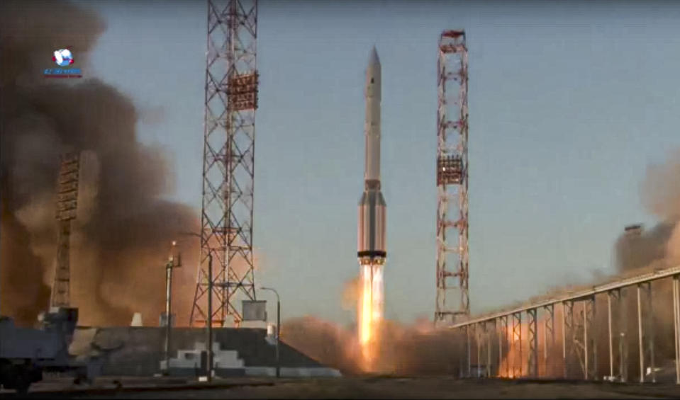 In this image taken from video provided by Roscosmos Space Agency Press Service, a Proton-M booster rocket carrying the Nauka module blasts off from the launch pad at Russia's space facility in Baikonur, Kazakhstan, Wednesday, July 21, 2021. Russia has successfully launched a long-delayed lab module for the International Space Station. The module is intended to provide more room for scientific experiments and space for the crew. (Roscosmos Space Agency Press Service photo via AP)