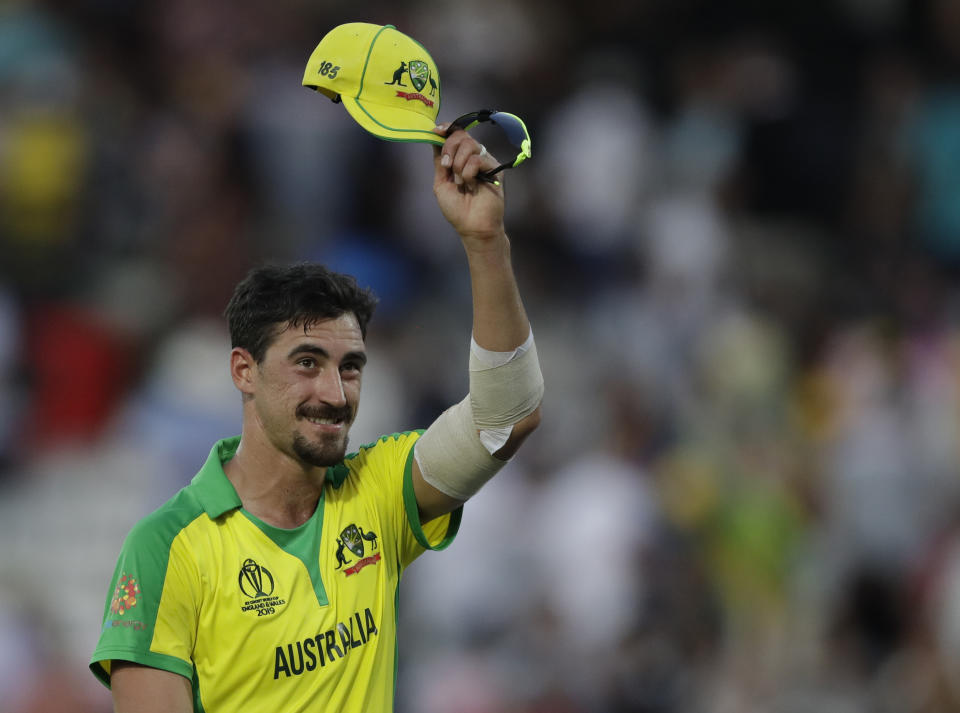 Australia's Mitchell Starc raises his cap to the crowd as he walks off the field after Australia defeated New Zealand by 86 runs during the Cricket World Cup match between New Zealand and Australia at Lord's cricket ground in London, Saturday, June 29, 2019. Starc took 5 wicket in the match . (AP Photo/Matt Dunham)